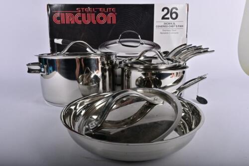 KITCHENWARE: A collection of pots and pans including Scanpan and Royal Doulton, together with a Steel Elite Circulon '26' lidded saucepan in box, all unused
