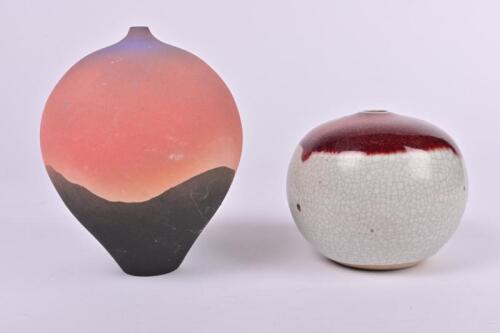 POTTERY: Two bulbous form vases, one crackle glazed, the largest 15cm high
