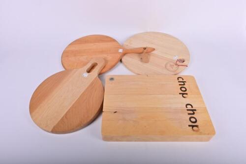 BREADBOARDS: Four wooden breadboards and a knife blocks, the largest 34cm x 24cm wide