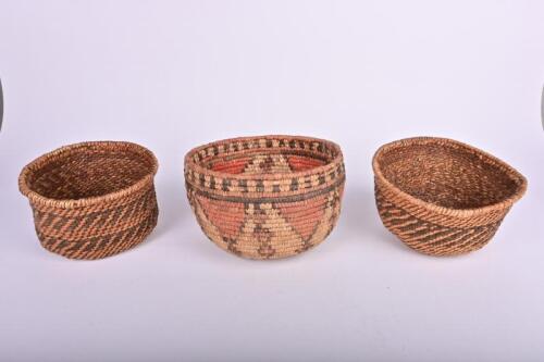 NATIVE AMERICAN: A hand woven Navajo bowl, 21cm wide and two other Native American woven bowls, ex-Christie's New York