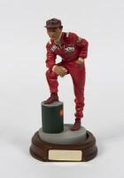 NIKI LAUDA: A 1:9 scale cold cast limited edition porcelain figure scale of Niki Lauda, with COA, 21.5cm high