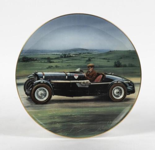 ASTON MARTIN: A limited edition Coalport china plate featuring an Aston Martin 1935 Ulster at speed