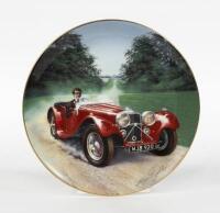 JAGUAR: A Coalport limited edition plate featuring a Jaguar SS100 designed by Melvyn Buckley