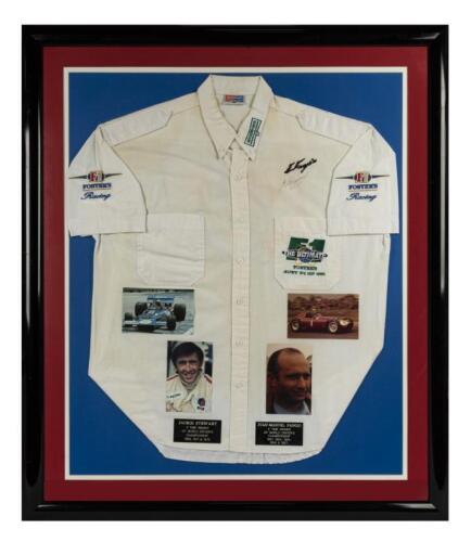 AUTOGRAPHS: A window mounted 1991 Australian Grand Prix shirt signed by Jackie Stewart and Juan-Manuel Fangio