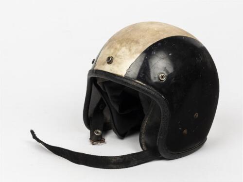 HELMET: Bryan Thomson's original open faced racing helmet in black with white stripe, signed by Bryan