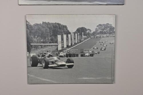 MOTORSPORT: Two period photographic repoductions of Australian racing scenes, inscribed on rear by Bryan