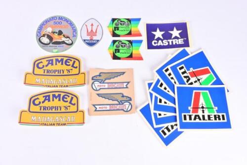 ITALIAN STICKERS: A collection of stickers carrying Italian brands and event participation. 'CAMEL TROPHY '87 - MADAGASCAR, ITALIAN TEAM' & 'MOTO DUCATI' stickers,