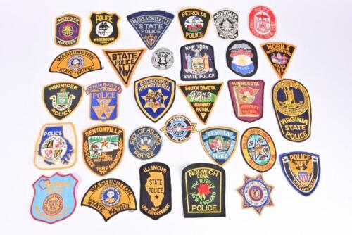 AMERICAN CLOTH BADGES: A collection of U.S State Police cloth badges. Atlanta, Massachusetts, New York cloth badges