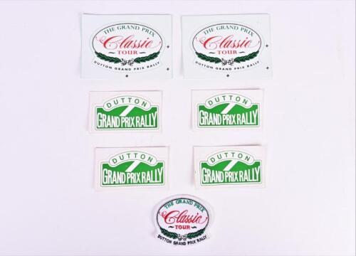 DUTTON: A group of Dutton Grand Prix Rally stickers and cloth badge