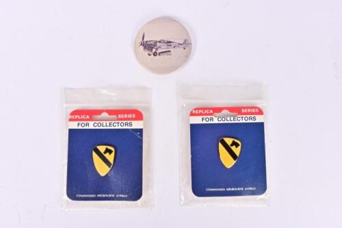 BADGES: Three pin badges including two Commando Melbourne badges