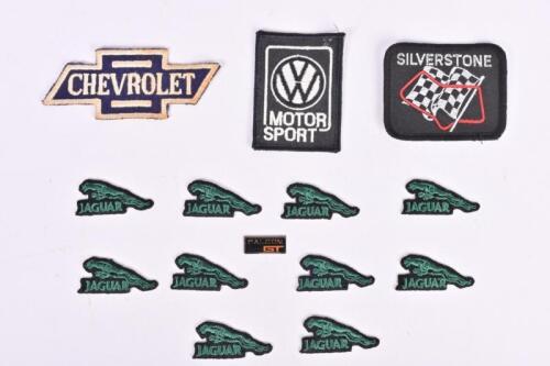 CAR/MOTORSPORT CLOTH BADGES: A small group of automotive and motor sport cloth badges. Jaguar 'leaper' cloth badges