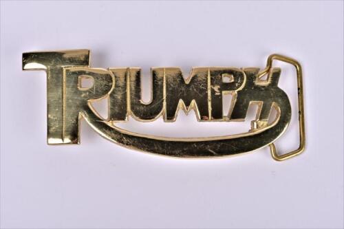 TRIUMPH: A brass "TRIUMPH" belt buckle as manufactured by TANSIDE LTD
