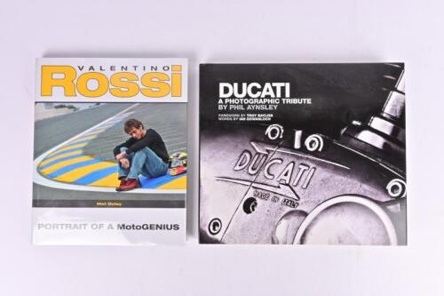 ROSSI/DUCATI: Two hardcover books detailing the career of Valentino Rossi and photographic history of Ducati. 'DUCATI - A PHOTOGRAPHIC TRIBUTE' hardcover book by Phil Aynsley