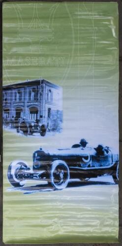 MASERATI: A large vinyl banner featuring the trident and images of prewar Maserati's, 348cm high
