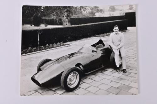 HILL: A black and white picture of Graham Hill with Vanwall. Original