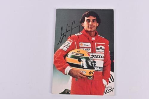 SENNA: A portrait photo of Ayrton Senna. Signed by Ayrton Senna