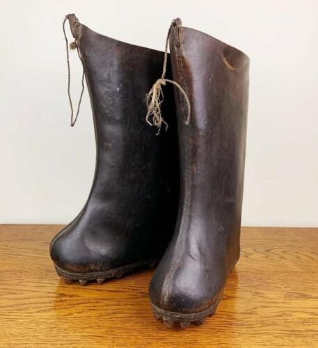 ANTIQUE BOOTS: An unusual pair of antique Chinese leather rice paddy boots