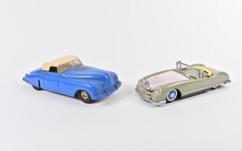 TIN TOYS: Two 1960s friction driven tin toys, the largest 26cm long