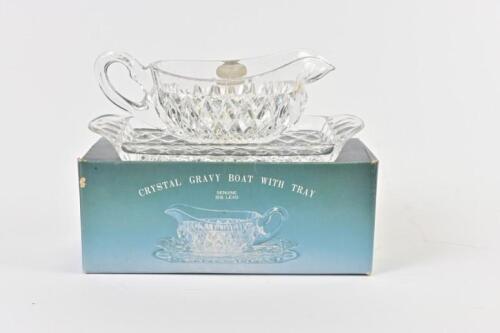 GRAVY BOAT: A crystal gravy boat and tray, new in box