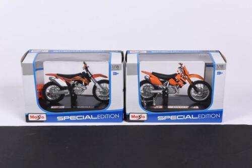 KTM: TWO NOS 1:18 scale Maisto 'Special Edition' KTM dirt bikes 525SX/450SX-F