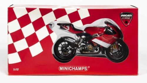 DUCATI: A NOS 1:12 scale Minichamps 'Ducati Corse' Ducati Desmosedici #12 Troy Bayliss - Moto GP 2003