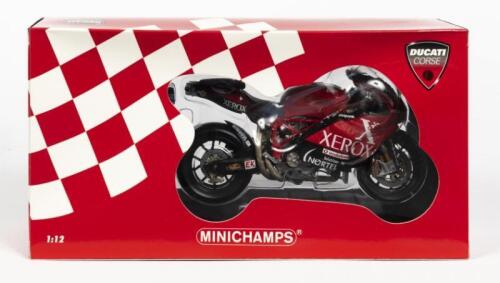 DUCATI: A NOS 1:12 scale Minichamps 'Ducati Corse' Ducati 999RS #24 Garry Mc Coy - WSB 2004