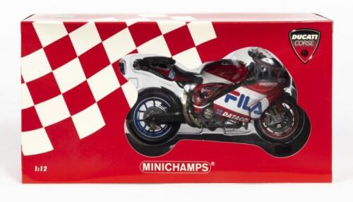 DUCATI: A NOS 1:12 scale Minichamps 'Ducati Corse' Ducati 999 F04 #52 James Toseland - WSB 2004