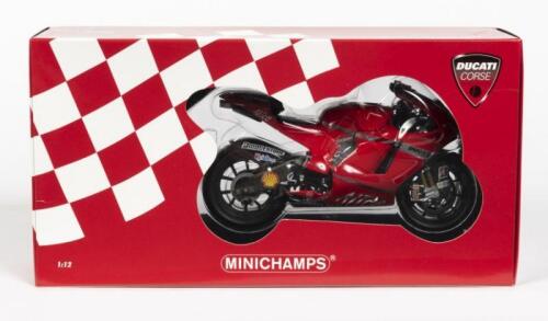 DUCATI: A NOS 1:12 scale Minichamps 'Ducati Corse' Ducati Desmodici GP8 #1 C.Stoner "Ducati Team" - Moto GP 2008