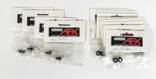 AFX SPARES: A NOS Aurora AFX parts including numerous tyres/ pinion gears/ rear axle assemblies