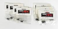 AFX SPARES: A NOS Aurora AFX parts including numerous tyres/ pinion gears/ rear axle assemblies