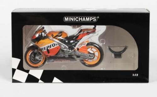 HONDA; A NOS 1:12 scale Minichamps Honda RCV212V " Repsol Team" #1 Casey Stoner - Moto GP 2012