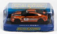NISSAN: A NOS 1:32 scale ScaleXtric Nissan GT-R 'Miller/Adamson #975' slot car