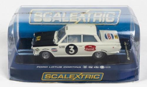 FORD: A NOS 1:32 scale ScaleXtric Ford Lotus Cortina ' Huges/Young #3' slot car, 'Kenya Safari'