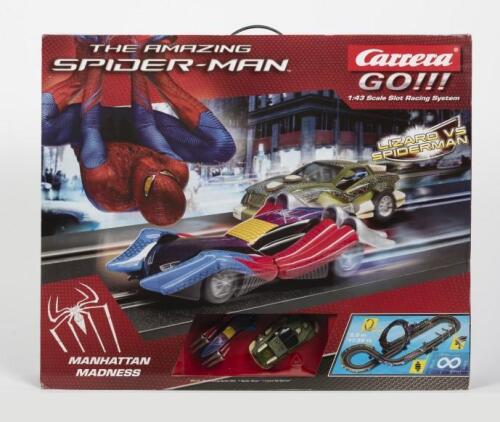 CAR RACING SET: A NOS 1:43 Carrera GO car racing set "The amazing spider man" 'Manhattan Madness - Lizard VS Spiderman' including 2 slot cars Spider racer/ Lizard tail spinner and a total of 5.3m of tracks