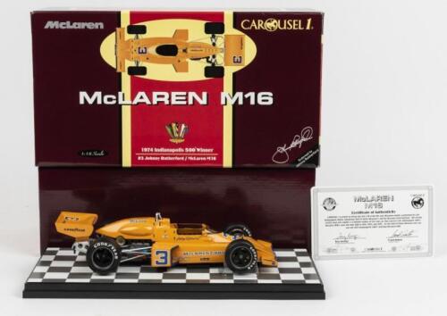 McLAREN: A 1:18 scale Carousel 1 McLaren M16 (Team McLaren) #3 Johnny Rutherford - 1974 Indianapolis 500 Winner with CoA
