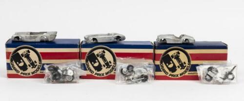 WHITE METAL KITS: Three white metal kits by 'GRAND PRIX MODELS'. Austin Healey 3000, Daimler SP250 "DART", Triumph TR2