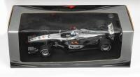WEST MCLAREN-MERCEDES: Rare 1:18 scale Minichamps factory West edition McLaren-Mercedes MP4-16 #4 David Coulthard NIB