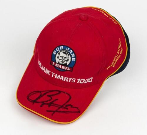 JANE: A red BOB JANE T-MARTS 1000 cap. Visor signed by Bob Jane