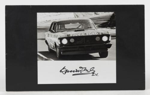 McKAY: A black and white picture of David McKay driving a 1971 Ford Falcon XY GTHO Phase 3. David McKay signature