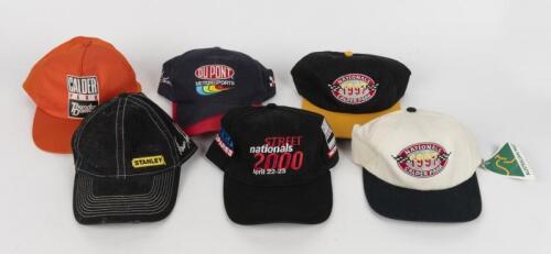 RACING CAPS: A collection of promotional racing caps. Marcos Ambrose, Geoff Gordon caps