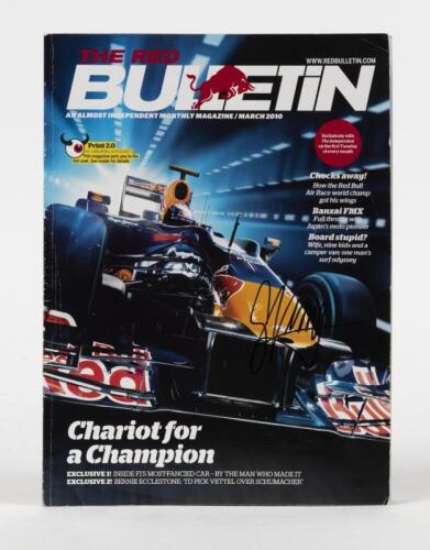 RED BULL/VETTEL: A copy of 'THE RED BULL BULLETIN' magazine from March 2010. Front cover signed by Sebastian Vettel