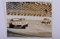 SHELBY: A black and white photograph by Dave Friedman of the Shelby Cobra Daytona Coupe as driven by Bob Holbert and Dave MacDonald at the 1964 Daytona