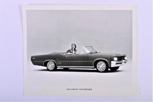 PONTIAC: A black and white press photograph of a 1963 LeMANS CONVERTIBLE