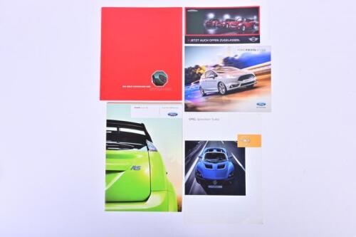 GERMAN: A group of German text car sales brochures including Ford Focus RS, Opel Speedster Turbo, MG F