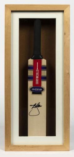 DENNIS LILLEE: A framed miniature cricket bat signed by Dennis Lillee, inscribed verso: Dennis Lillee, Australian Team of the Century