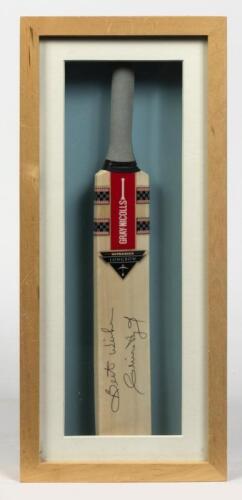 CLIVE LLOYD: A framed miniature cricket bat signed by Clive Lloyd, bears stickers inscribed verso: Clive Lloyd, 41 x 18.5cm