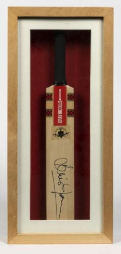 BRIAN LARA: A framed miniature cricket bat signed by Brian Lara, inscribed verso: Brian Lara