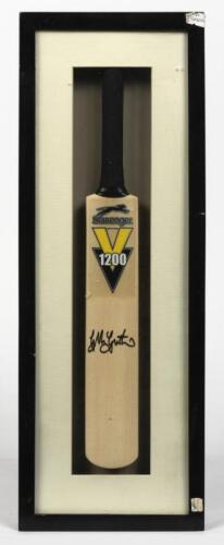 GLENN MCGRATH: A framed miniature cricket bat signed by Glenn McGrath, inscribed verso: Glenn McGrath