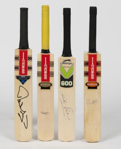 MINIATURE CRICKET BATS: A collection of four signed miniature cricket bats
