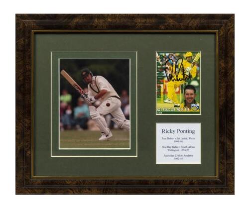 RICKY PONTING: A framed photo and signed Weet-bix card by Ricky Ponting, the frame 24 x 30cm